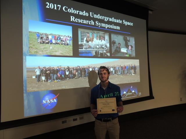 Christain Prather, Grand Prize winner at the research symposium for best talk and paper.