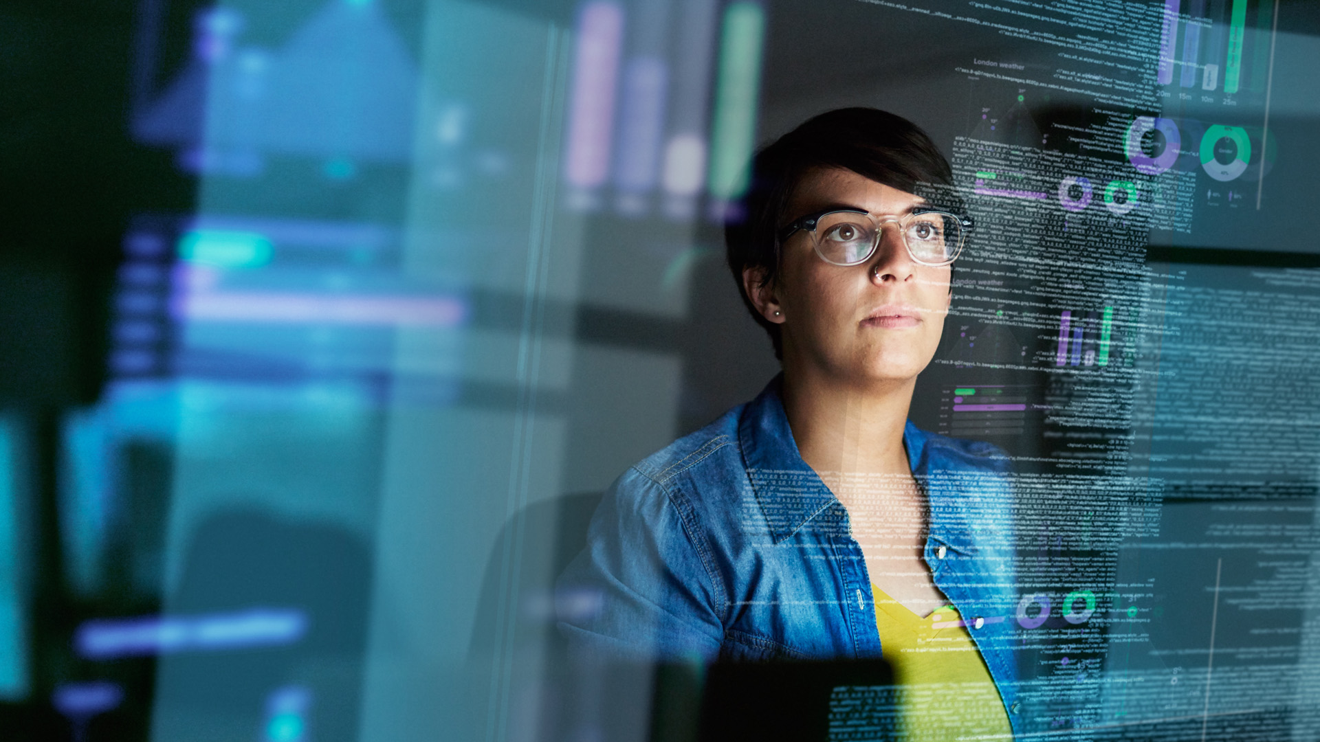 Woman looking at computer code