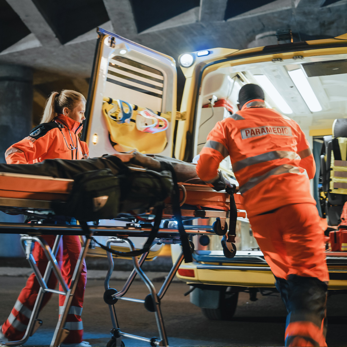 Team of EMS Paramedics React Quick to Provide Medical Help to Injured Patient