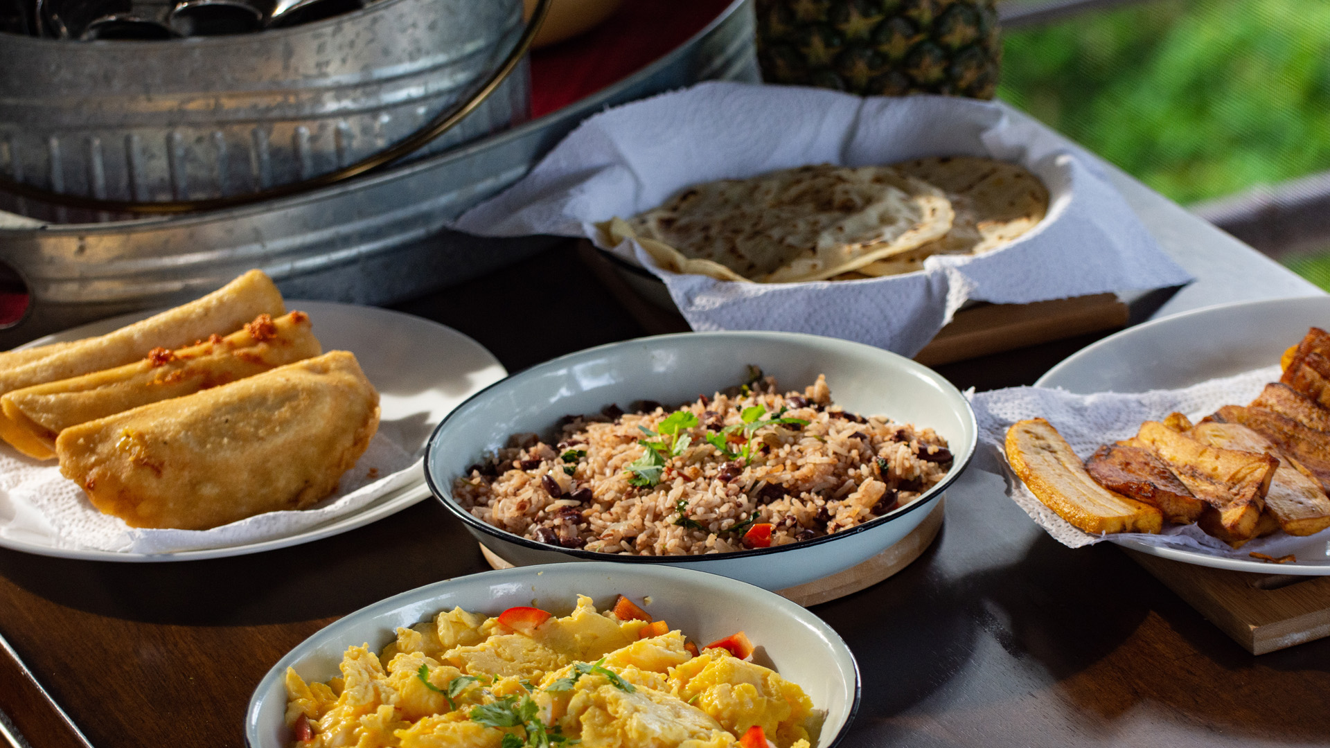 plates of food outside on table