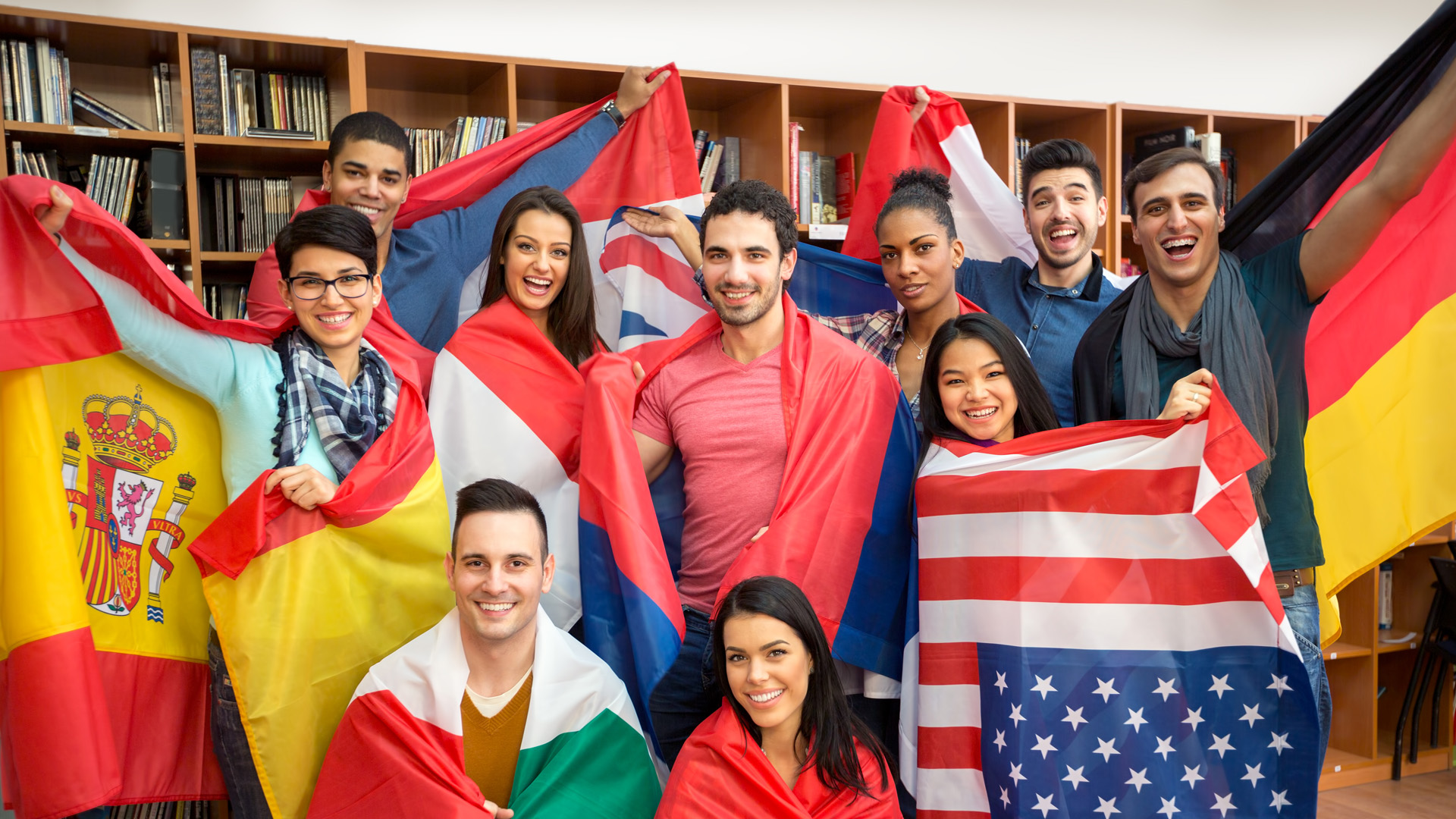 students holding up different flags