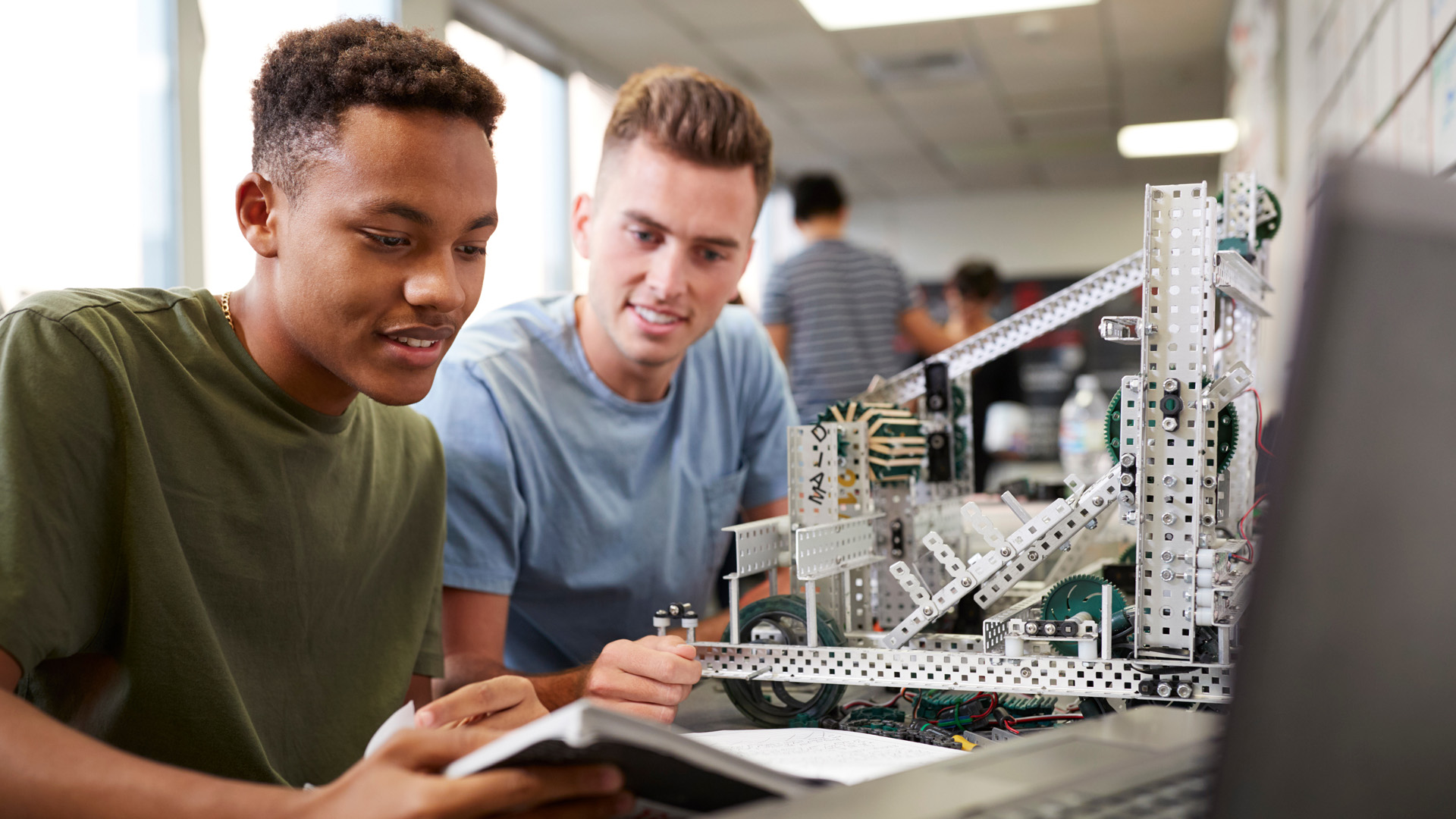 two Male students working on a project