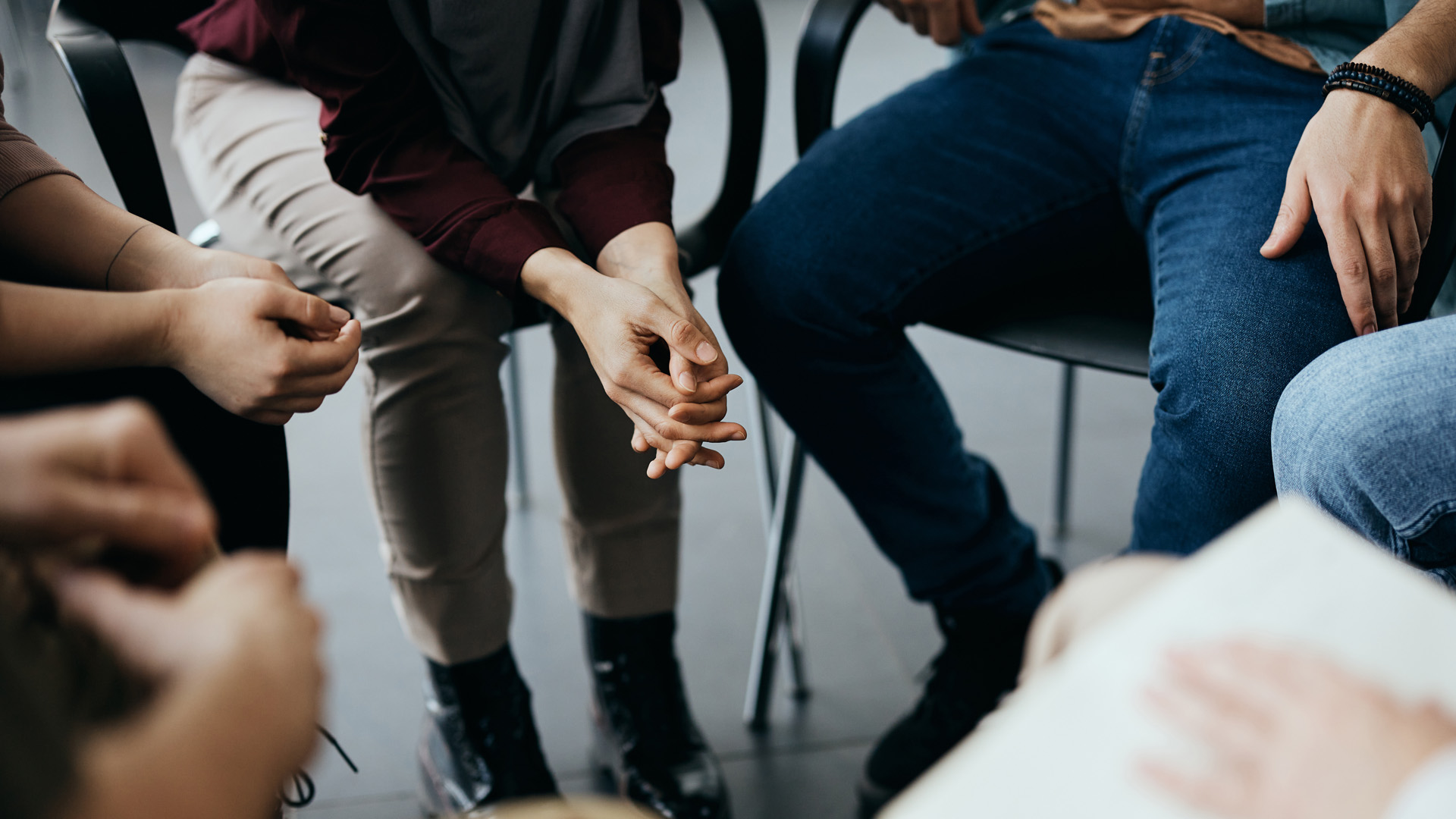 people gather in a group talking