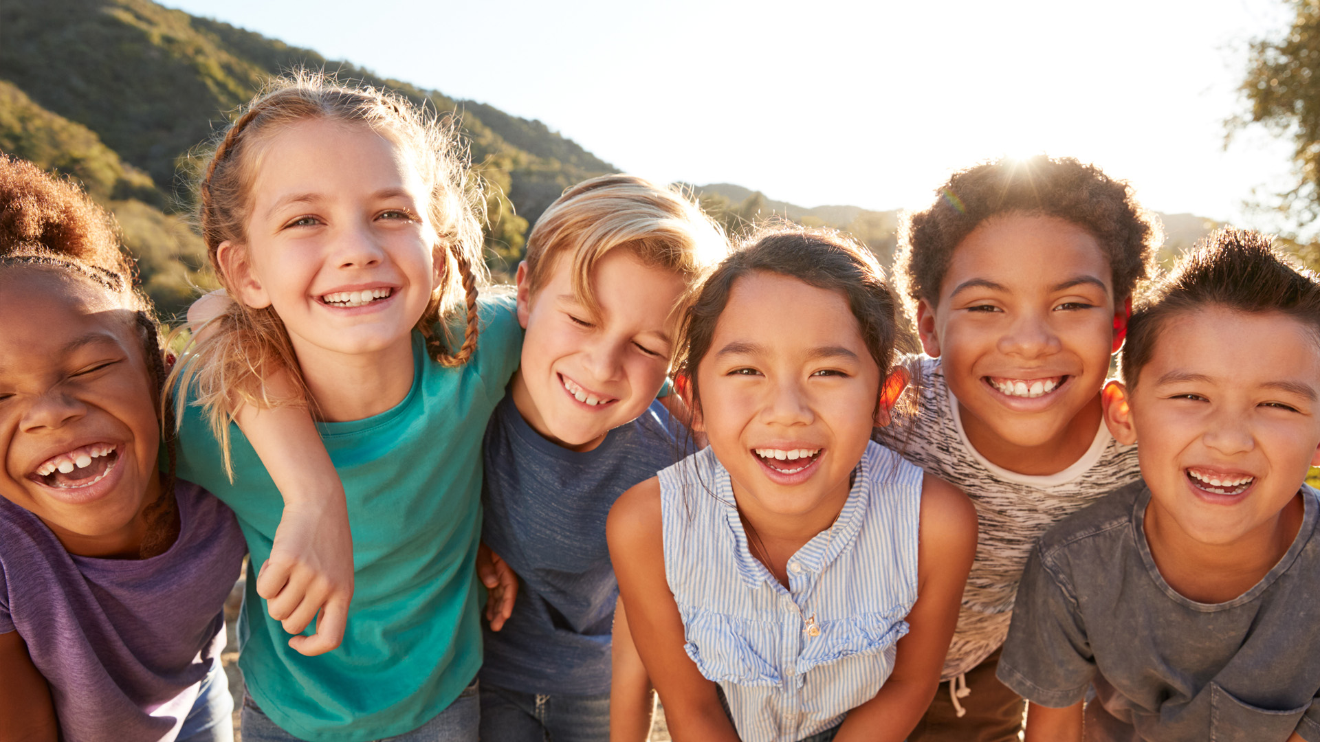 Children Hanging Out With Friends In Countryside Together
