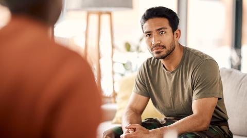 veteran sitting in office