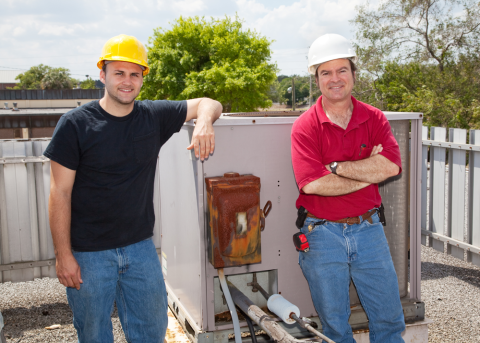 HVAC people with hard hats