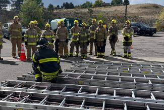 Red Rocks Community College Fire Science students outside practicing ladder drills
