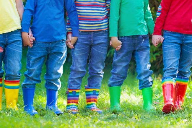 Kids in rain boots. Rubber boots for children