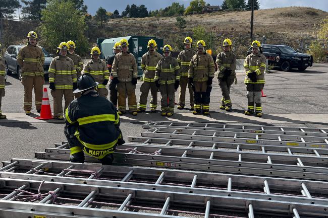 Red Rocks Community College Fire Science students outside practicing ladder drills