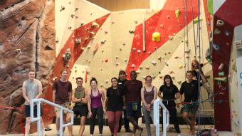 Students in front of the SRC rock wall