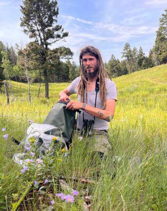 Bradley Harz in a field