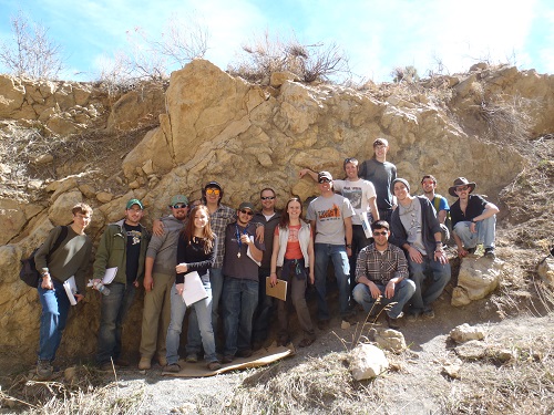 Historical Geology class photo taken at nearby field site with impressive dinosaur footprints