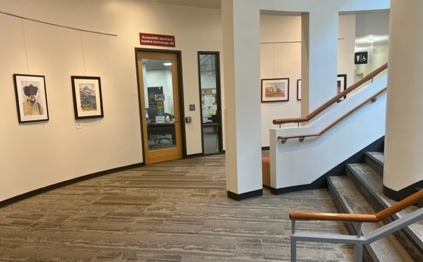 Photo of the Accessibility Services office. The office is situated in the art gallery and is next to the stairs leading up to the Learning Commons and library.