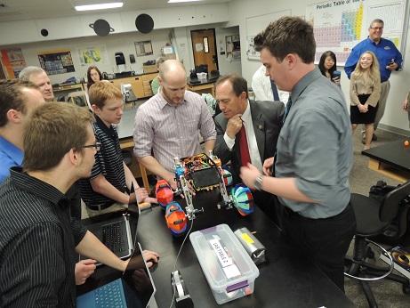 Congressman Purlmutter came to Red Rocks to meet with all of our Space Grant Teams. This photo shows him checking out our robot with some of the team members