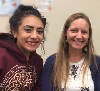 two smiling students